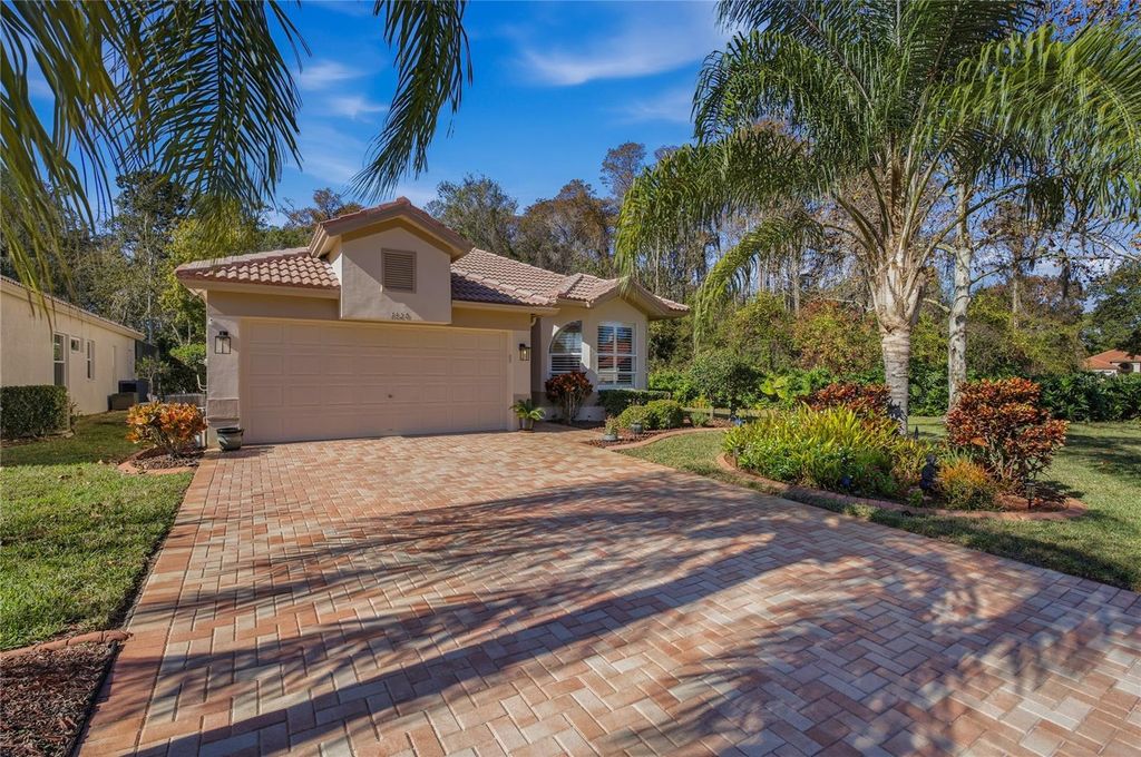 Photo of 1320 Lindenwood Drive, Tarpon Springs, FL 34688 (MLS # W7881084)