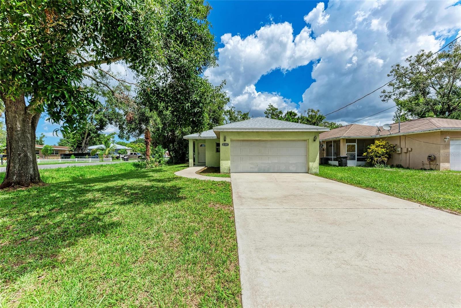 Three bedroom, 2 car garage, traditional block/stucco home situated on a corner lot. Built in 2001. Exclusive Savings: Seller offering Floor credit or an Interest Rate Buydown Credit for the new owner to help lower monthly payments and increase overall buying power. This way, you get the two-car garage/block home you have been hoping for! The flexible pass-thru kitchen design connects to the main living space. Indoor washer and dryer setup so you are not doing your laundry in and out of the garage in the Florida humidity. Great location for commuting to St Pete or Tampa. Easy access to 275 and Skyway. Close to all your shopping and dining needs by SR70.
