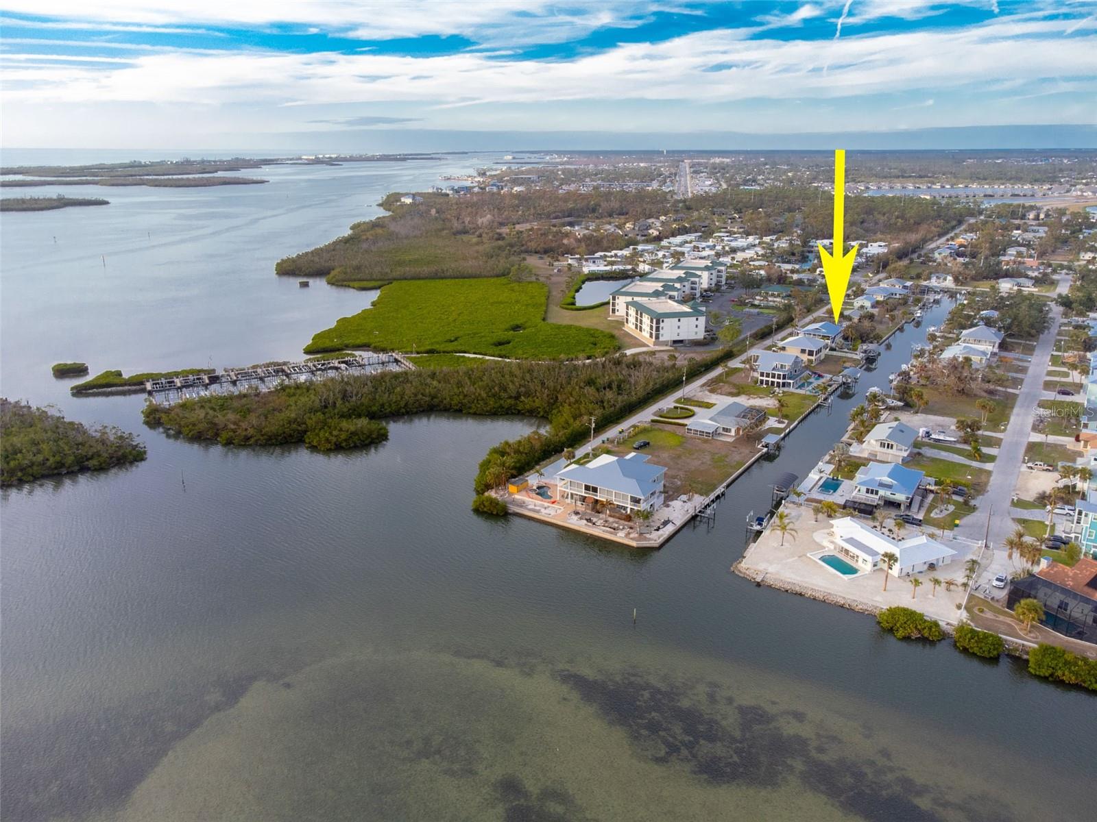 This deep-water sailboat property presents an exceptional opportunity to create your ideal waterfront lifestyle. Situated with direct access to the Gulf of Mexico via Stump Pass – just minutes away – the property features a brand-new, 12,000 lb boat lift on a solid concrete seawall, ensuring effortless boating adventures. Imagine spending your days exploring Lemon Bay and nearby beaches with no fixed bridges to navigate.
While the existing 1,370 sq ft home was recently affected by flooding, this blank canvas allows you to either renovate and reimagine the current structure or design and build an elevated, flood-resilient home tailored to your exact specifications. The expansive 12,300 sq ft lot also includes a valuable 22x14 detached building, perfect for storage, a workshop, or hobbies. Adding to the value, the property boasts a new metal roof installed in 2021.
Embrace the tranquility of canal views and the peaceful ambiance of waterfront living. This prime location offers unparalleled access to world-class fishing, stunning beaches, and a variety of vibrant waterfront dining options. Should you choose to renovate, the existing home has been thoughtfully prepared for its next chapter, with the drywall removed, a new electrical panel and complete wiring installed, and new plumbing throughout.
This is a rare chance to secure a well-positioned deep-water property and craft the waterfront retreat you've always envisioned. Don't let this unique opportunity pass – schedule your viewing today and begin to imagine the possibilities!