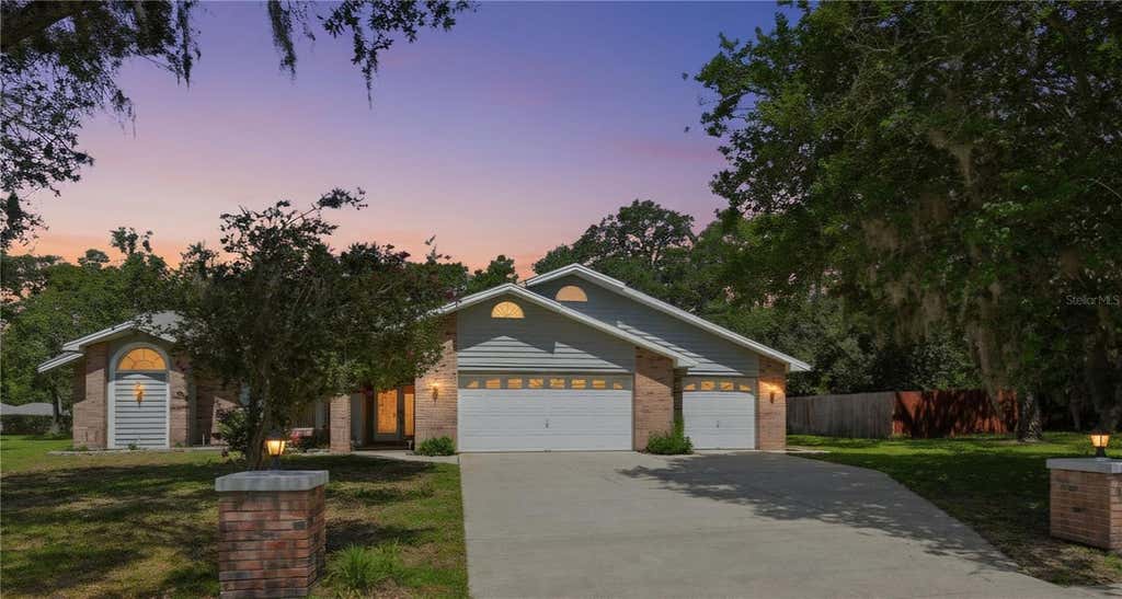 Photo of 18451 Winding Oaks Boulevard, Hudson, FL 34667 (MLS # W7886480)