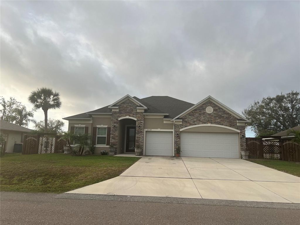 Photo of 23149 Hammond Avenue, Port Charlotte, FL 33954 (MLS # O6374645)