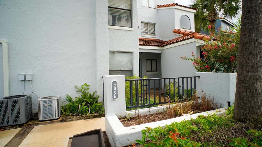 Photo of 4836 Marks Terrace #394, Orlando, FL 32811 (MLS # O6432536)