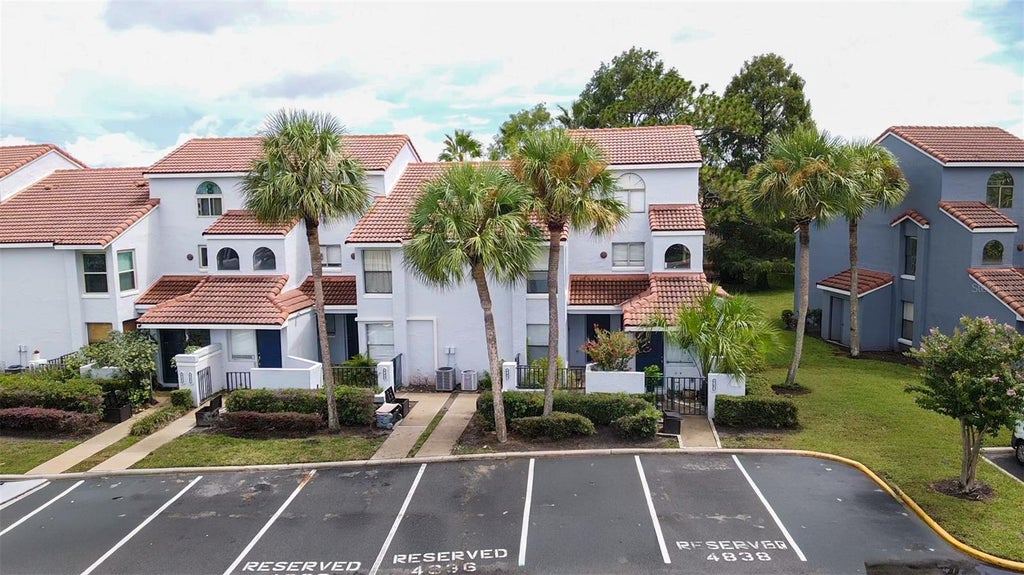 Photo of 4836 Marks Terrace #394, Orlando, FL 32811 (MLS # O6432536)