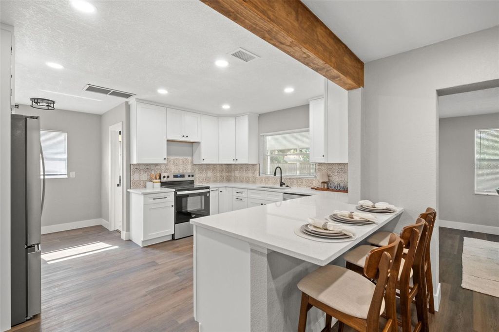 Photo of 1472 Ruth Road, Dunedin, FL 34698 (MLS # TB8464709)