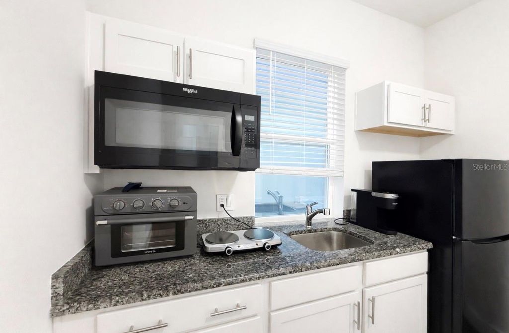 Photo of 13049 Michael Callin Alley, Orlando, FL 32828 (MLS # O6372331)