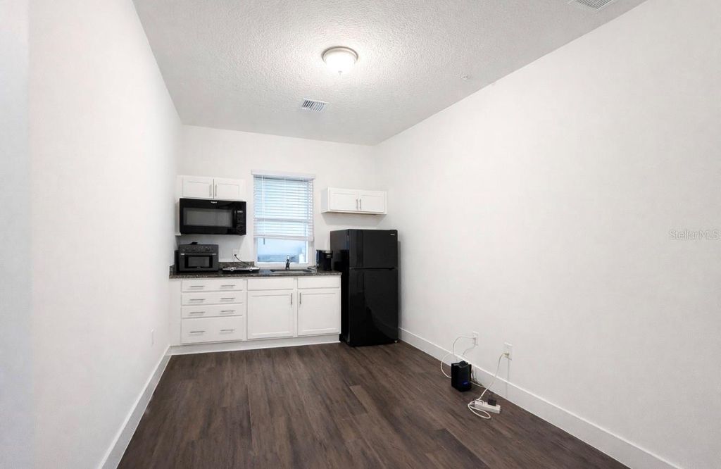 Photo of 13049 Michael Callin Alley, Orlando, FL 32828 (MLS # O6372331)