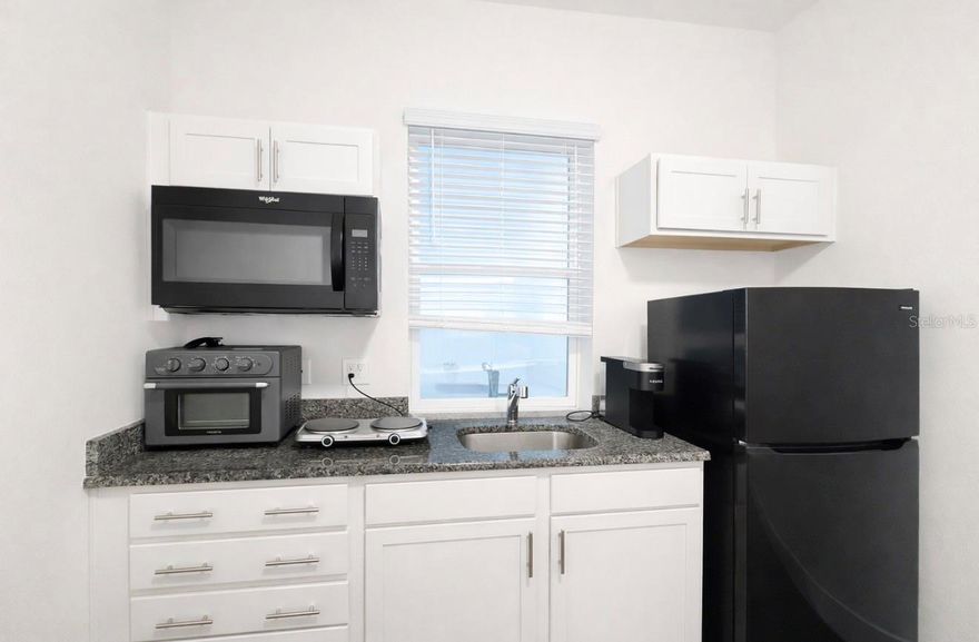 **WATER AND ELECTRICITY + INTERNET INCLUDED** Only $1450 a Month for one person!! *Rent for two occupants is $1,525 per month.*

Located in the desirable Avalon Park community, this one-bedroom, one-bath garage apartment offers a comfortable and open-concept layout where the living room, dining area, and kitchen flow together seamlessly. The kitchen features granite countertops, with matching white quartz finishes in the bathroom for a clean, modern look. This apartment comes with an in unit Washer and Dryer. This newer, well-maintained garage apartment provides a fresh and contemporary feel throughout. Avalon Park offers a vibrant Town Center with restaurants, shops, and everyday conveniences, including a Publix located just across the street. Residents also enjoy access to multiple community amenities, including swimming pools, basketball, baseball, volleyball, tennis, and pickleball courts, along with nearby top-rated schools. Approximately 20 minutes from UCF, and 15 minutes away from the famous Waterford Lakes shopping center!