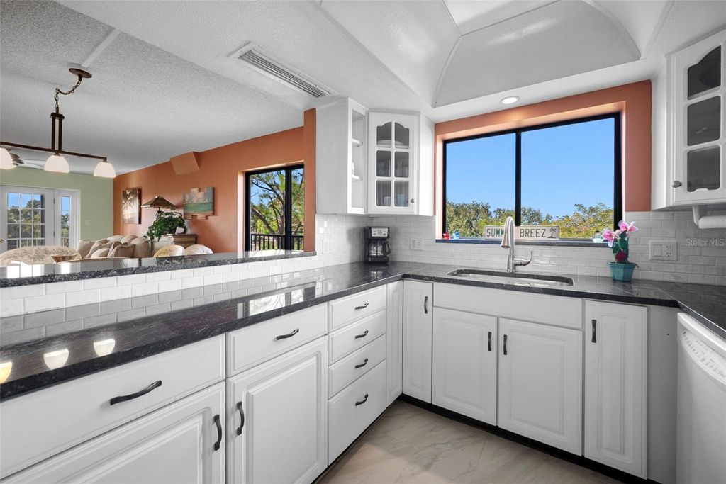 Photo of 408 Tarpon Pt, Tarpon Springs, FL 34689 (MLS # W7880519)