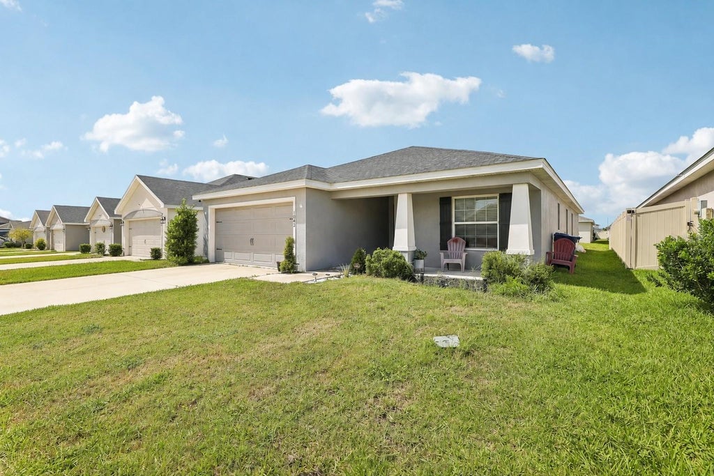 Photo of 1042 Corso Dr, Winter Haven, FL 33884 (MLS # TB8542841)