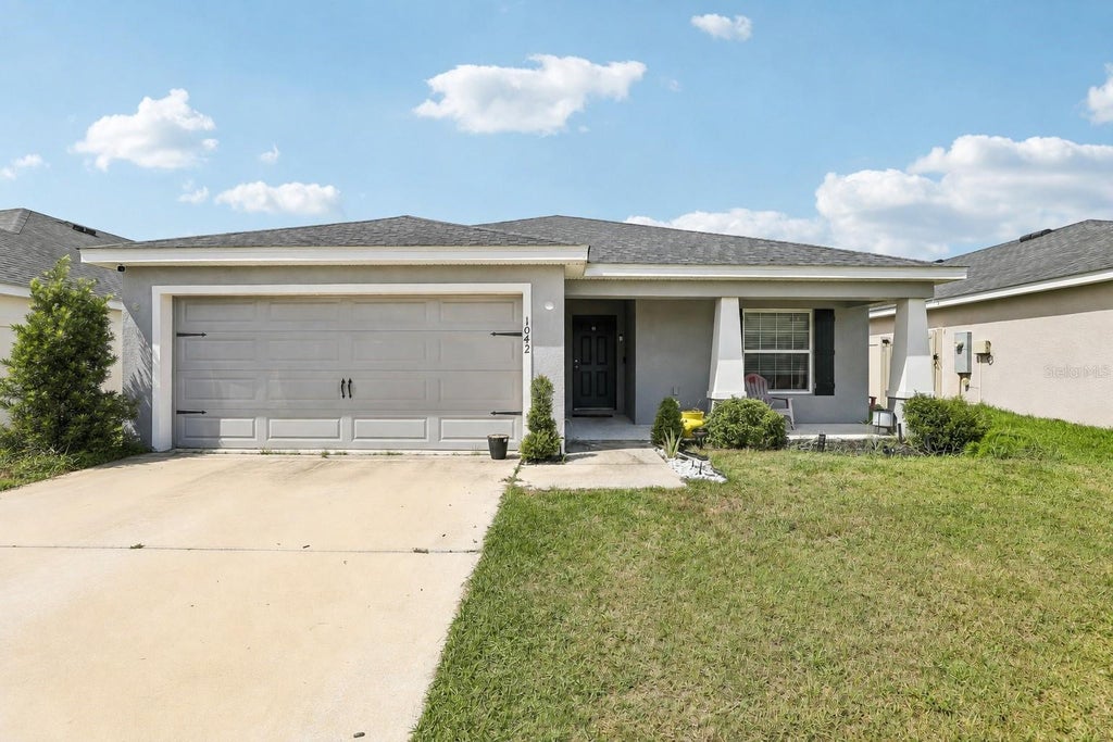 Photo of 1042 Corso Dr, Winter Haven, FL 33884 (MLS # TB8542841)
