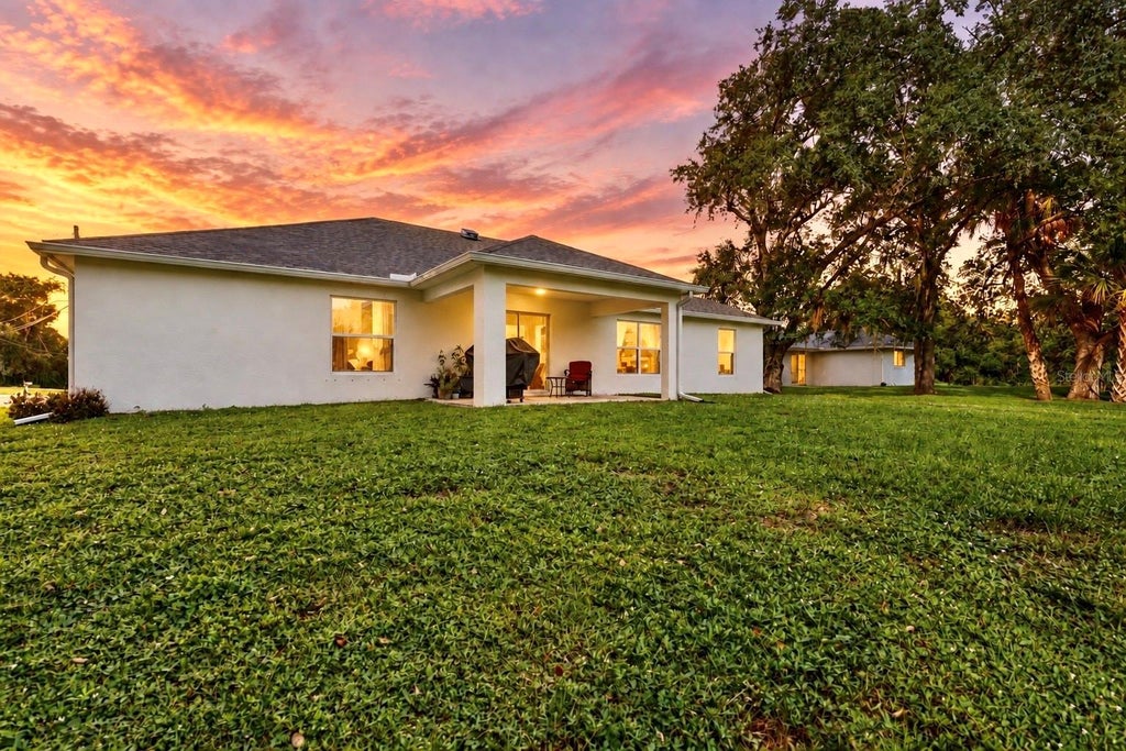 Photo of 1953 Rada Lane, North Port, FL 34288 (MLS # C7531562)