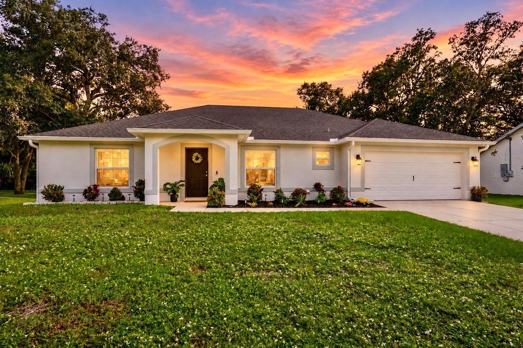 Photo of 1953 Rada Lane, North Port, FL 34288 (MLS # C7531562)