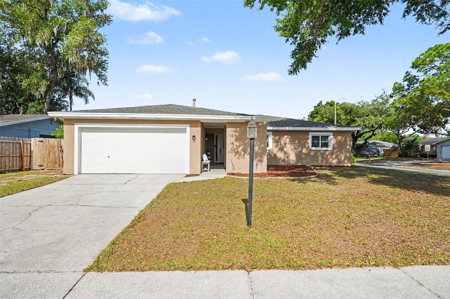Honey stop the car! This is the one! Home was completely remodeled in 2020 - move in ready with open floor plan and tons of natural light. New Roof, New AC, New Water Heater all installed in 2020. Enjoy a beautiful, renovated kitchen with granite countertops and island perfect for entertaining and family dinners. Both the master and 2nd bathroom have been renovated with granite countertop vanities and attractive porcelain tile. Enjoy your large fenced in back yard and beautiful corner lot. NO HOA / NO CDD - Bring your toys and enjoy additional parking next to the driveway. Great location, close to shopping, malls, dining, entertainment and easy access to I-75 and 1-4. New Hurricane rated windows with argon gas (installed in 2021). Schedule a showing today, won't last!