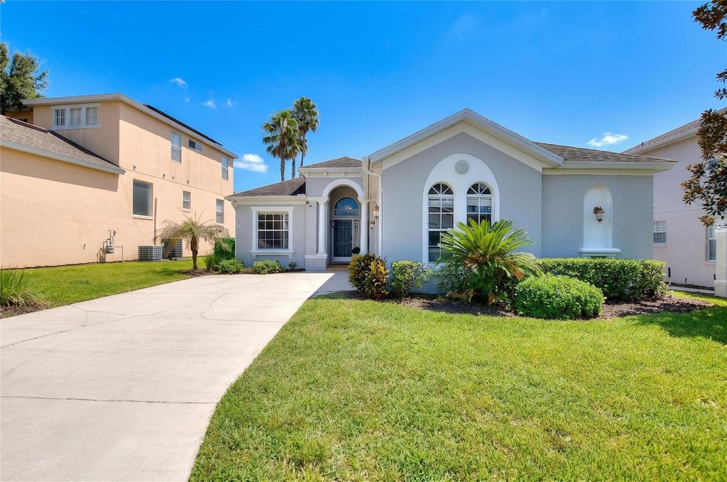 Photo of 313 Plumoso Loop, Davenport, FL 33897 (MLS # S5159254)