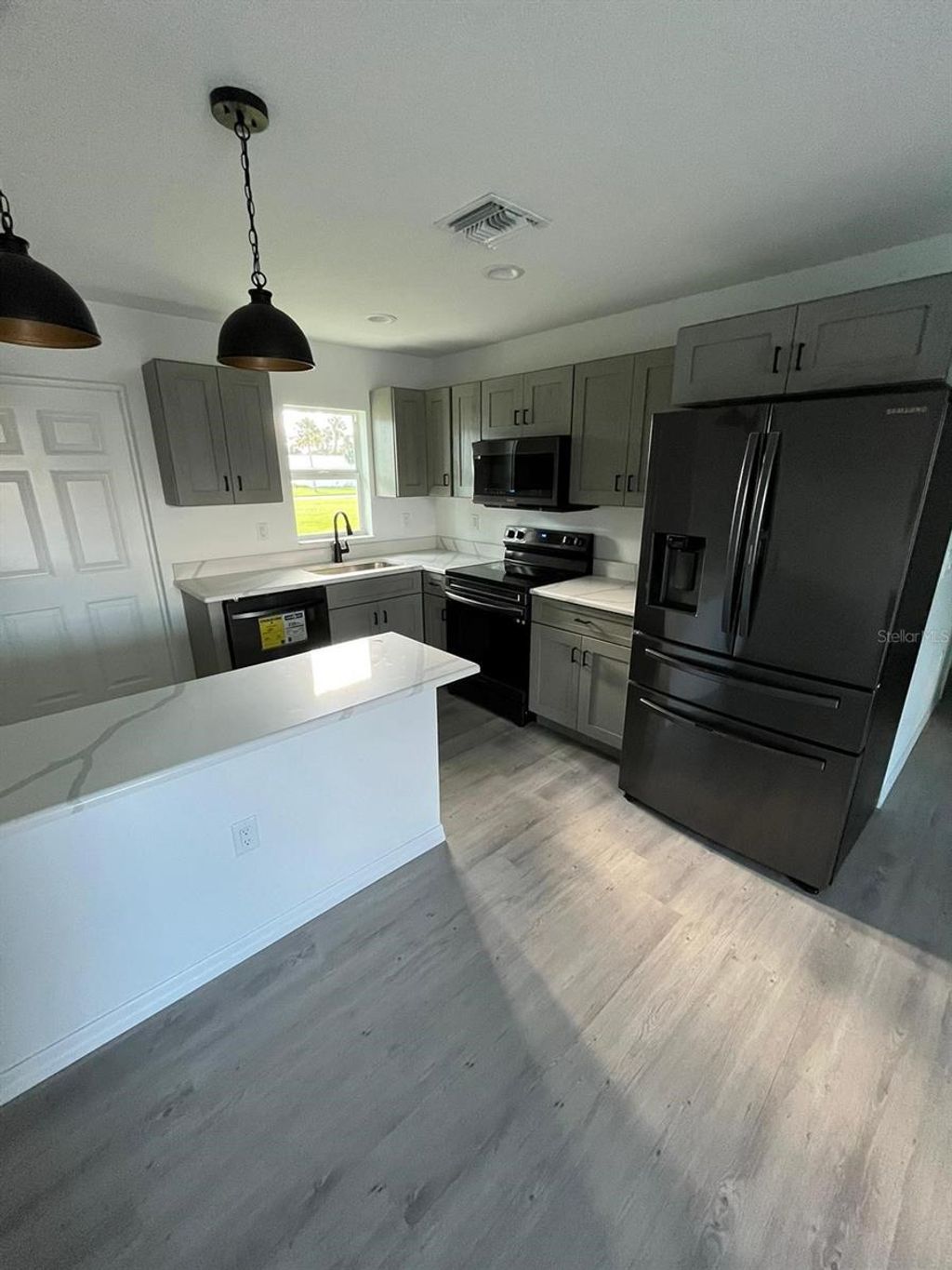 Photo of 5218 SE 43rd Street, Okeechobee, FL 34974 (MLS # TB8445800)