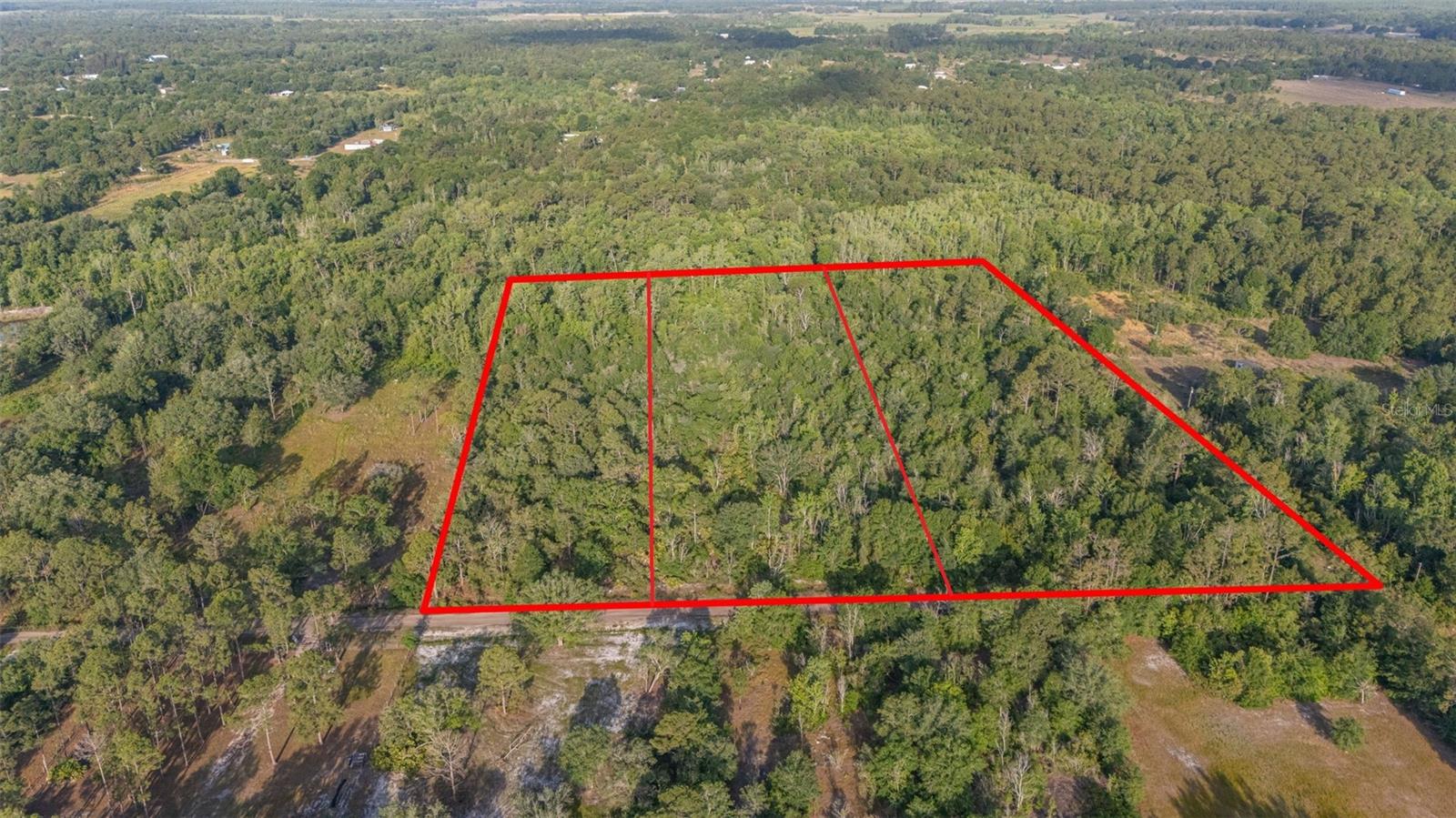 Discover a rare opportunity to own three spacious, buildable lots totaling 13.51 acres in the serene countryside of Frostproof, Florida. Located on Kelly Ridge Road, these adjoining parcels offer the perfect blend of rural tranquility and convenient access to major cities and highways.
Whether you’re looking to build your dream home, develop multiple residences, or simply invest in Florida land, this expansive property offers incredible flexibility and potential. With no HOA restrictions, you’ll have the freedom to bring your vision to life – whether that’s a custom estate, a private family compound, or even a small agricultural venture.
Nestled between Lakeland, Winter Haven, and Sebring, this central location offers quick access to Hwy 27 and Hwy 98, making commuting to Tampa, Orlando, or coastal destinations a breeze. You’re also just minutes away from a variety of shopping, dining, and entertainment options while still enjoying the peace and privacy of country living. Opportunities like this are few and far between – don’t miss your chance to own a prime piece of Central Florida real estate. Contact us today for more details or to schedule a private showing!