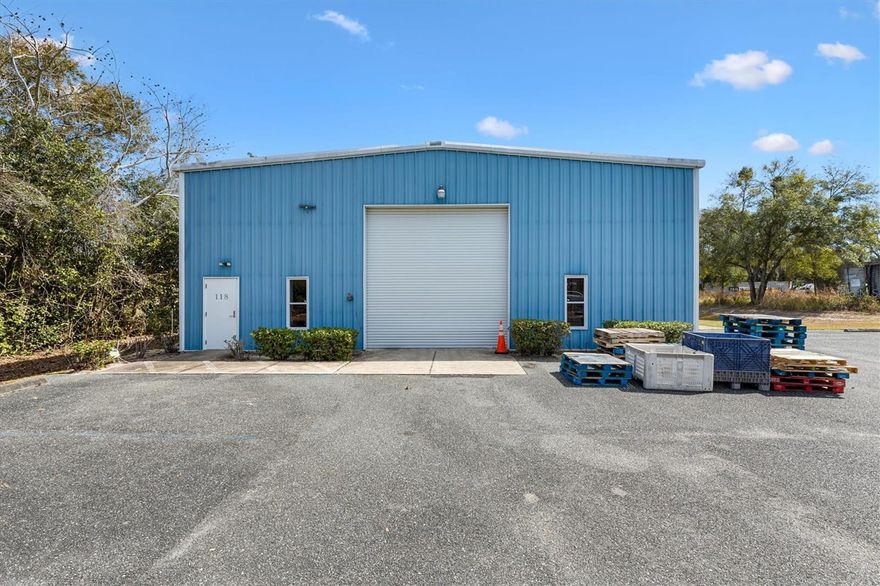 AVAILABLE APRIL 1. PRIME 5,000 SF WAREHOUSE FOR LEASE – LEESBURG, FL: This well-located 5,000± SF clear-span, insulated warehouse/office property is ideally situated just off State Road 44 in the City of Leesburg, offering strong visibility and immediate access to the rapidly growing Lake County market, including The Villages, Groveland, and the Florida's Turnpike. Situated on a spacious 1.08-acre lot, the property provides abundant laydown yard, excellent truck maneuverability, and ample room for trailers, equipment, outdoor storage, and additional parking. The ±900 SF office component includes three private offices, a large mezzanine area, and two restrooms, while the remaining ±4,100 SF warehouse features a functional clear-span layout, 16-foot eave height, and a 14’x14’ automatic grade-level roll-up door, making it ideal for industrial, service, distribution, or contractor use. With limited comparable inventory in the area and additional land and storage capacity available, this versatile Central Florida opportunity will not last—call today to schedule a private tour.