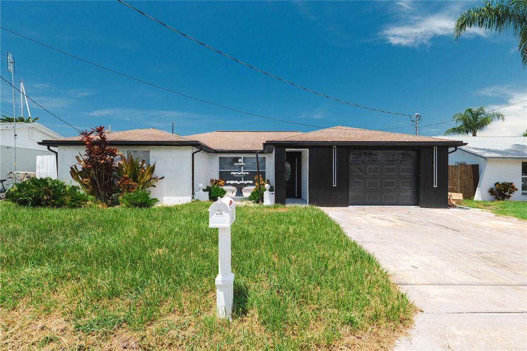 Photo of 13923 Helen Avenue, Hudson, FL 34667 (MLS # TB8407932)