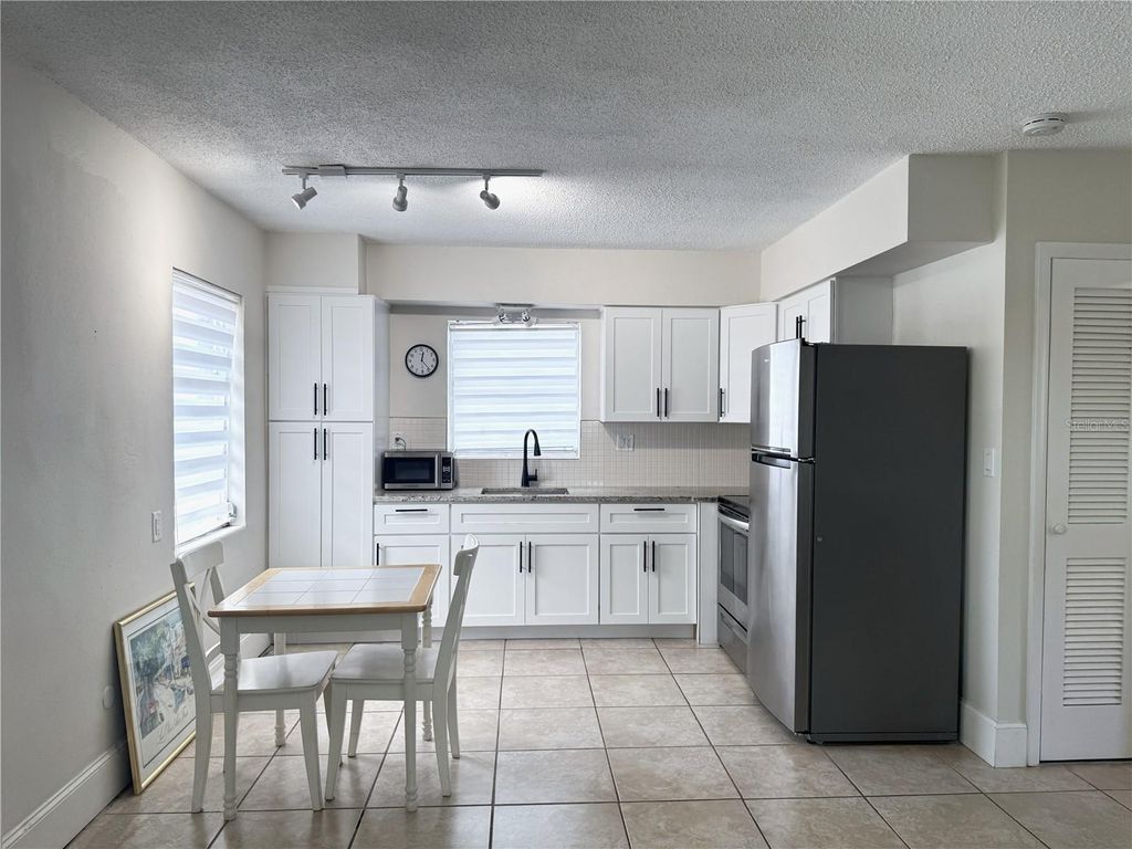 Photo of 1196 Angle Road, Dunedin, FL 34698 (MLS # TB8494606)