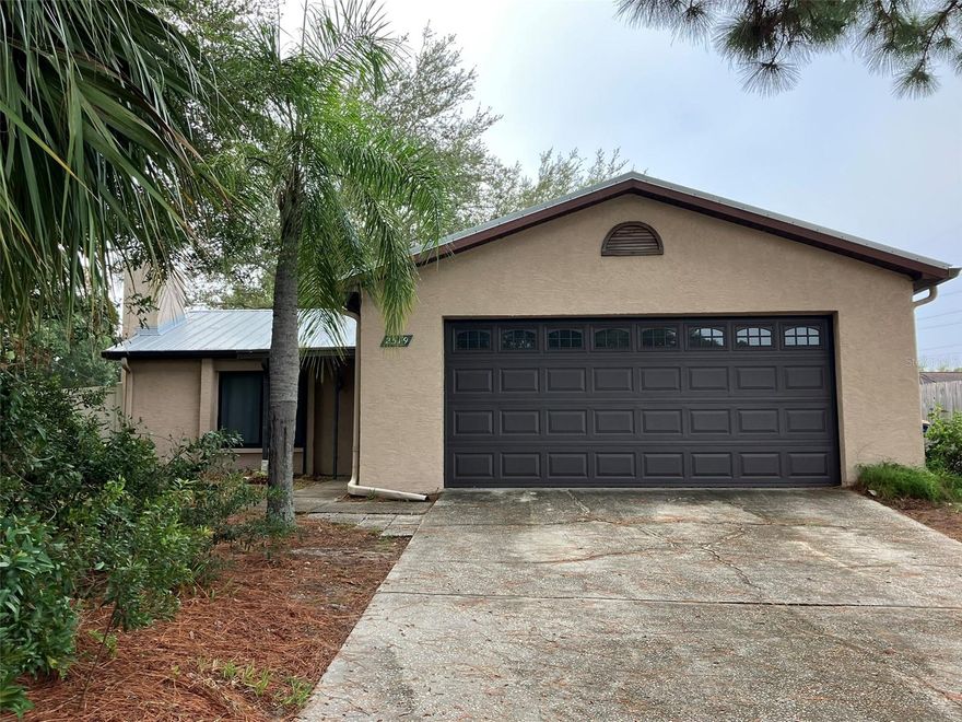 This charming 3 bedroom, 2 bath home welcomes you into the spacious family room with wood burning fireplace. The eat in kitchen has a slider that exits into a fenced in yard. Large master suite is at the end of the hall. The oversized 2 car Garage Home is located on a corner lot in a quiet cul de sac. General maintenance of the certified Florida Friendly Landscaping is included in the rent but yardwork to remain a courteous neighbors is still required. 
Please contact listing agent for online link to application and fee details.