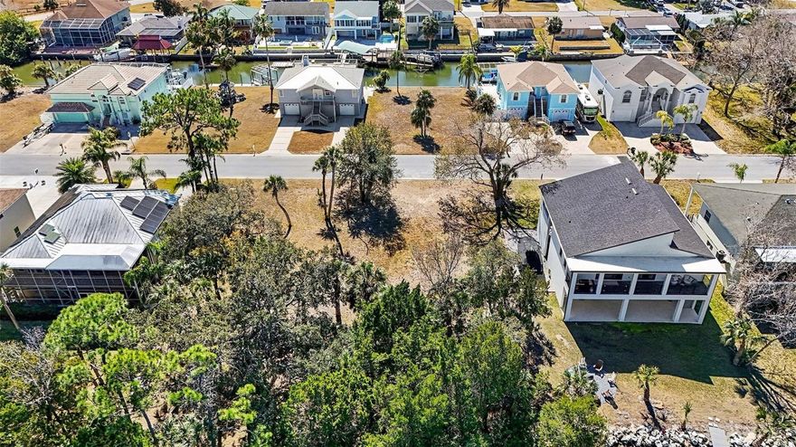 Build your own dream home and enjoy the Florida Gulf Coast lifestyle. The Preserve at Sea Pines is a waterfront community featuring canal-side properties. Lot size .27 acres. This vacant lot has convenience with access to electricity, plus public water, and public sewer. With the canal right across the road and a boat ramp walking distance away with no backyard neighbors because there's a preserve located in the back of the home. This vacant lot is a must see with the street consisting of beautiful homes on a cul-de-sac road. The private boat ramp offers direct access to Gulf of Mexico. Cost to use is an optional $100 fee for a year access. This property provides easy access to boating, fishing, scalloping, and stunning sunsets over the water.

This lot places you in one of Hudson’s most desirable areas, with nearby Hudson Beach, SunWest Park, and a variety of waterfront dining options. Whether you envision a cozy coastal retreat, a modern waterfront estate, or a private vacation home, this property gives you the flexibility to bring your vision to life.

Enjoy the laid-back Gulf Coast lifestyle, where peaceful canals, friendly neighbors, and abundant outdoor recreation make every day feel like a vacation. With convenient access to shopping, local amenities, and just an hour from Tampa International Airport, this is an opportunity to invest in prime Florida coastal land before it’s gone.