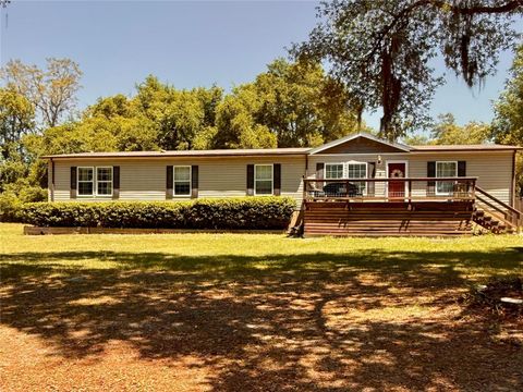 Photo of 9711 SE Highway 464c, Ocklawaha, FL 32179 (MLS # OM723134)
