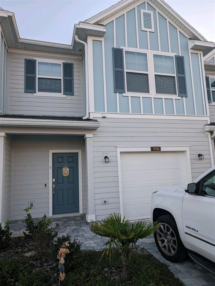 Live the life you've always dreamed of in Northern St. Johns County's premier luxury community of Beachwalk.  This stunning 2 bedroom, 2.5  bathroom townhome is now available and shows like a model.  The homes open and contemporary design is perfect for both relaxing and entertaining.  The main level boasts of beautiful tile flooring leading you into the heart of the home.  The open kitchen is a chiefs delight, featuring deep farm  stainless kitchen sink and stainless steel appliances.  Beautiful quartz countertops offers an array of room for both prepping and functionality.  Adjacent  dining and gathering areas create a seamless flow perfect for hosting friends and family along with a peaceful lanai to enjoy a slight breeze.  Upstairs,  you will encounter the spacious master bedroom complete with a large walk-in closet and spa-like bathroom with double vanities and walk in shower.   A second full bathroom features a full-sized shower and tub with a single vanity.  As a resident , you will receive a privileged Crystal Lagoon  membership granting you access to unparalleled resort style lifestyle..  Enjoy free live music, swim up bar, food trucks , state of the art fitness center,  splash park and tennis courts.  Enjoy everyday convenience of shopping and dining and only minutes away from St. Augustine beaches!  Your new life  awaits you!