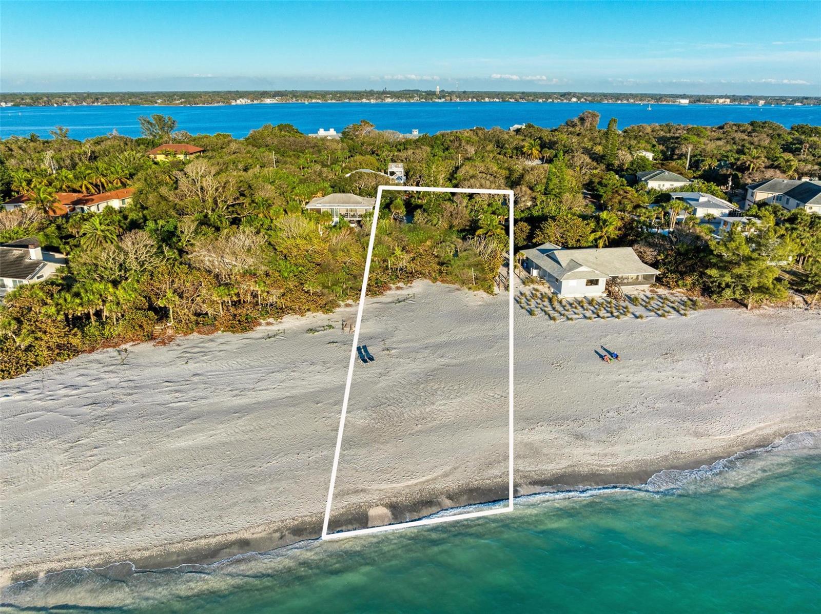 *Price has just been reduced by $770,000* With over 100 feet of pristine Gulf Front beach, this private beachfront lot offers unparalleled access to one of the widest stretches of sand on Manasota Key. Design and build your custom Gulf front home and experience the pinnacle of private island living. This parcel is situated on the exclusive Sarasota side of Manasota Key, where you can stroll for miles along a private beach and enjoy breathtaking sunsets and Gulf views.
Conveniently close to the vibrant restaurants, bars, and entertainment on the Charlotte County side of the island and just 15 minutes from major retail and dining options off-island.
Access to the property is a breeze, with major airports located within an hour's drive.
Don't miss the chance to design your personal slice of paradise on this stunning beachfront lot. Welcome to the true meaning of tropical island life!