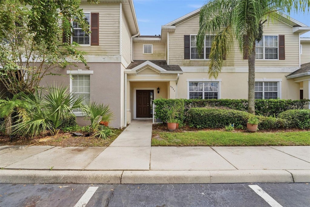 Photo of 4994 Town Terrace N, Kissimmee, FL 34758 (MLS # O6446576)