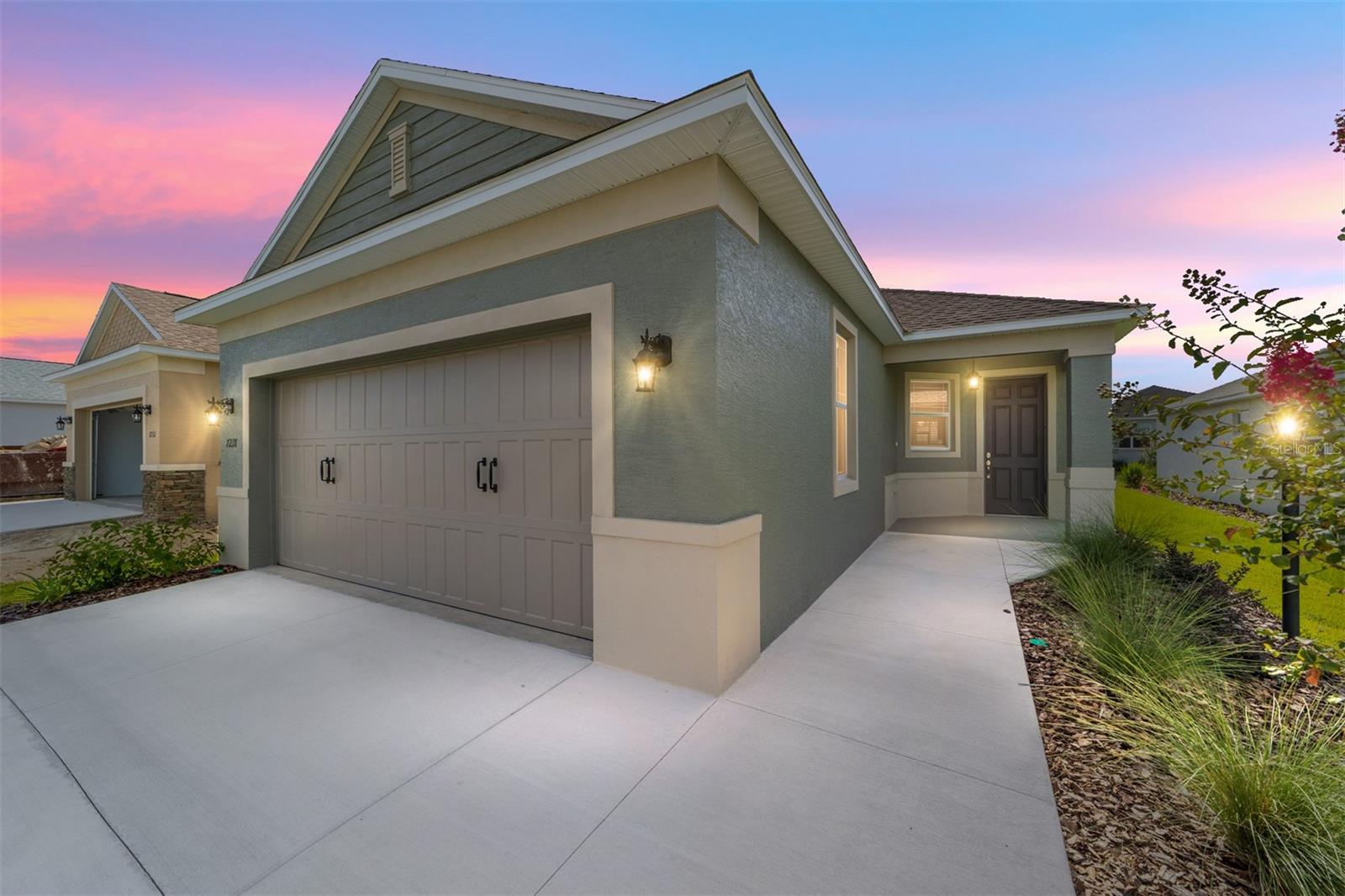 Welcome to the Oasis model, a brand-new construction home in the desirable community of Weybourne Landing at On Top of the World! This 2-bedroom, 2-bathroom, 2-car garage residence blends modern design with low-maintenance living. Luxury vinyl plank flooring extends throughout, adding both style and durability. The gourmet kitchen features premium white staggered cabinetry with crown molding, a designer backsplash, quartz countertops, and stainless-steel appliances, perfect for cooking and entertaining. The open concept living area flows seamlessly to a screened lanai through sliding glass doors, ideal for enjoying Florida’s year-round sunshine. The primary suite offers a relaxing retreat with a walk-in closet, two windows with blinds, and a spa-inspired en suite bath complete with quartz double vanity, tiled walk-in shower with glass enclosure, and built-in bench. The guest bath is equally well-appointed, featuring a quartz vanity and tub/shower combination. Located in the gated neighborhood of Weybourne Landing, this home provides access to resort-style amenities and the unmatched active-adult lifestyle that On Top of the World is famous for. Don’t miss your chance to own this move-in ready, brand-new home!