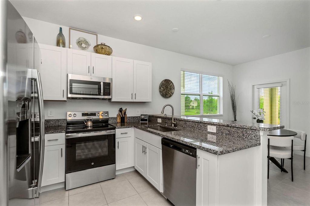 Photo of 10927 Wishing Cloud Road, Land O Lakes, FL 34638 (MLS # W7877810)