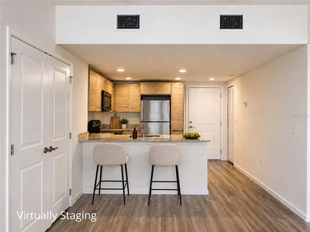 Photo of 1230 Southstation Place #201, Orlando, FL 32809 (MLS # O6435642)