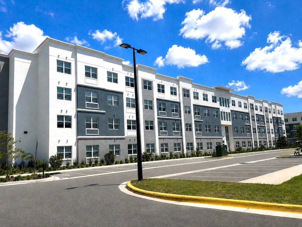 Photo of 1230 Southstation Place #201, Orlando, FL 32809 (MLS # O6435642)