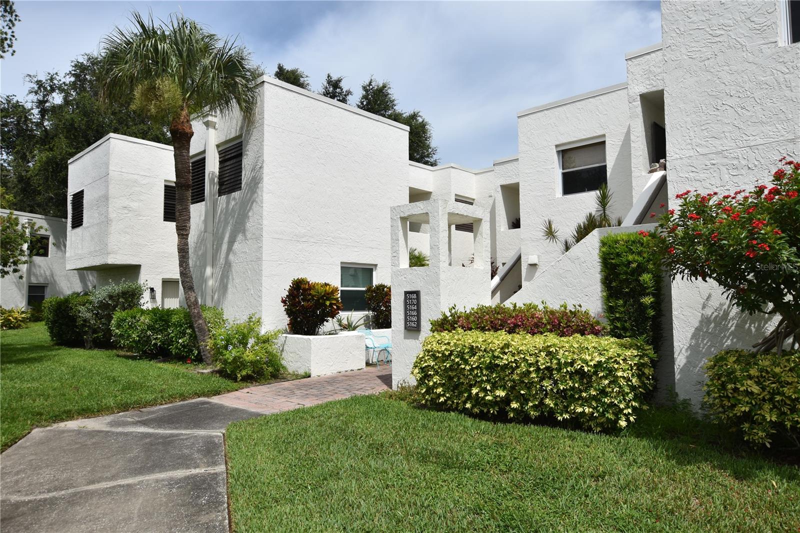 Heronmere II in The Meadows. Fantastic location near UTC with all the shops, restaurants and entertainments. Large 2nd floor corner unit - with carport. Tiled entrance with large lanai overlooking greenbelt and pool - split floor plan. New luxury Vinyl Plank flooring. New appliance package, new impact glass windows, freshly painted. Very peaceful - Fantastic community in a great location. The Meadows features 12 miles of hiking, biking and fitness trails, acres of open spaces, lakes, parks and moss laden trees. The Meadows is just a couple of miles from downtown Sarasota, beaches, St. Armands Circle, the new University Town Center Mall and Benderson Park. Easy access to I-75 and Sarasota/Bradenton Airport. Close to University Parkway, University Town Center Mall, restaurants, hospitals, I-75 and much more. NO pets, NO smoking.