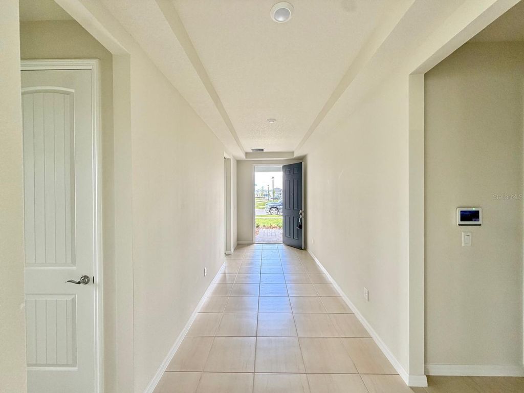 Photo of 6985 Dappled Oak Way, Orlando, FL 32829 (MLS # O6396922)