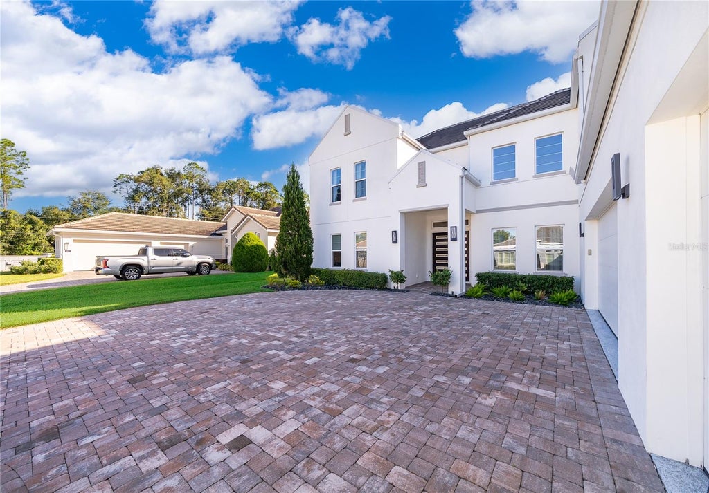 Photo of 1655 Canyon Oak Way, Sanford, FL 32771 (MLS # O6453857)