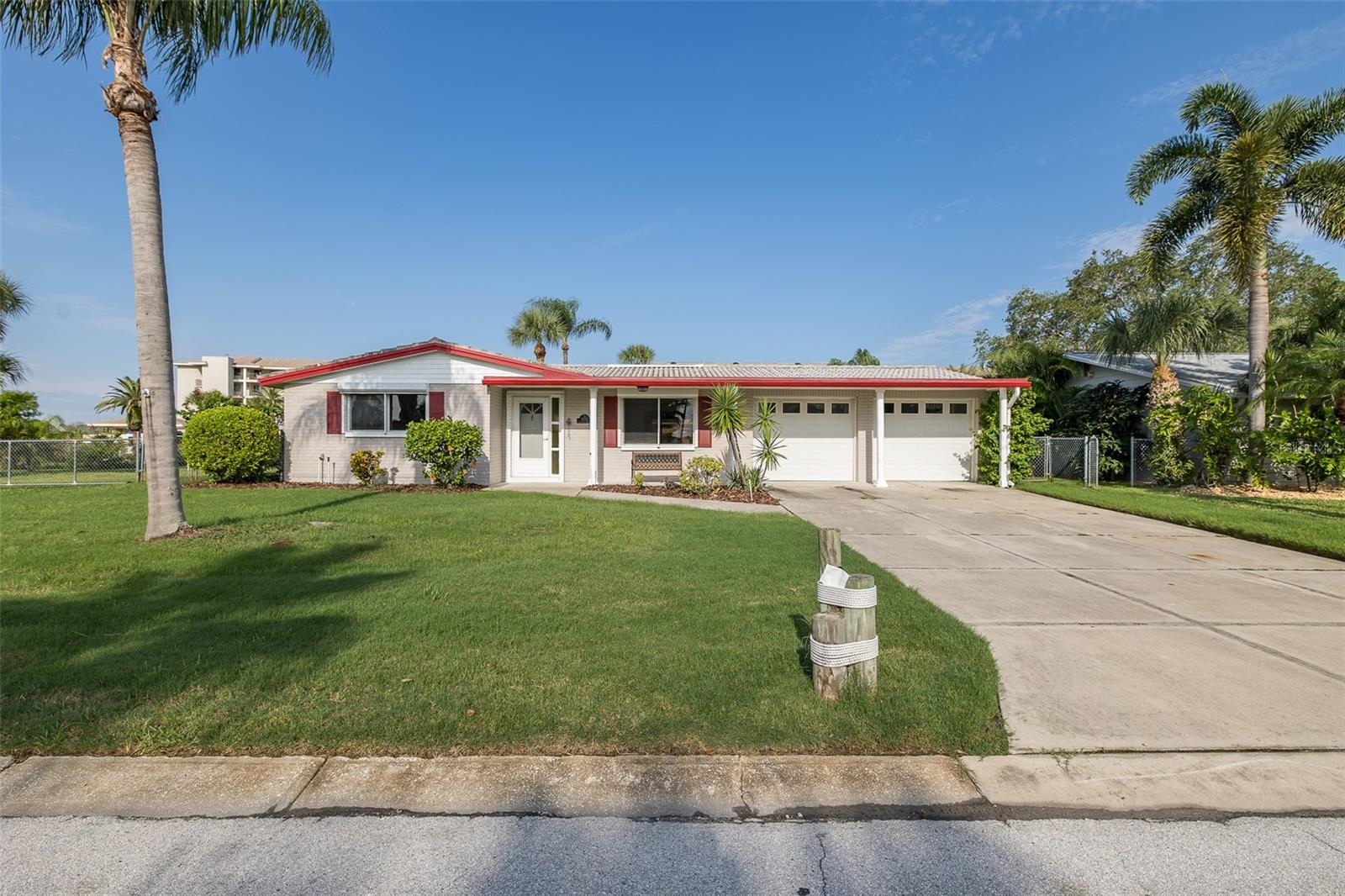This completely remodeled 2 bedroom, 2 bath home offers the perfect blend of modern updates and coastal living. Inside, you’ll find a spacious open floor plan with new tile flooring throughout, a beautifully updated kitchen with all-new cabinets, stainless steel appliances, and granite countertops, plus remodeled bathrooms with new vanities and granite counters. The large master suite includes a generous bath with a soaking tub, while a private office (with A/C) provides the perfect work-from-home setup.
Step outside to enjoy true Florida living—just 5 minutes to the open Gulf! The fenced backyard features a private dock, oversized parking pad, large utility shed, and custom-made hurricane shutters for peace of mind. A brand-new tile roof adds value and durability.
Other highlights include a huge 2-car garage and over ¼ acre of property that has been beautifully maintained.
This home truly has it all—space, updates, and waterfront access. Don’t miss your chance to see it today! ????