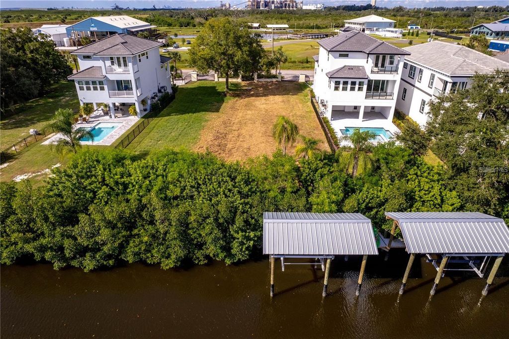 Photo of 538 Estuary Shore Lane, Apollo Beach, FL 33572 (MLS # O6320106)