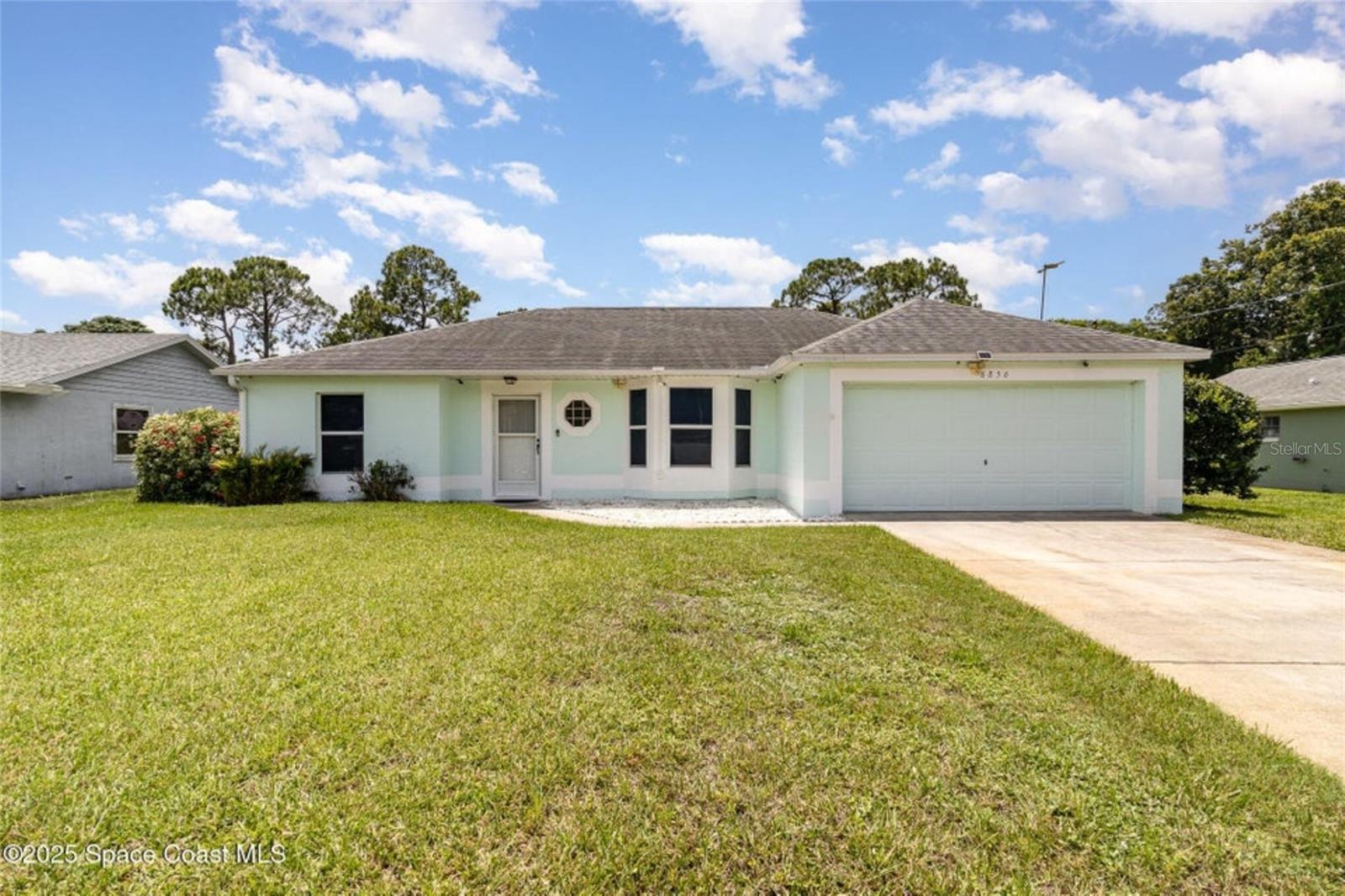 This 3-bedroom, 2-bathroom home spans 1676 sqft and offers a thoughtful layout perfect for growing families or anyone looking for room to spread out. The open-concept living and dining area makes it easy to stay connected. The kitchen is light, bright, and well-equipped—featuring ample cabinetry, stainless steel appliances, and a breakfast bar that's great for morning routines or after-school snacks. The primary suite includes a private bath and generous closet space, while the additional bedrooms are perfect for guests, or a home office. Out back, enjoy a fenced-in yard with a covered patio, ideal for backyard barbecues, family games, or simply relaxing under the Florida sky. Located in a quiet, family-friendly neighborhood with no HOA, you're just minutes away from local schools, parks, shopping.