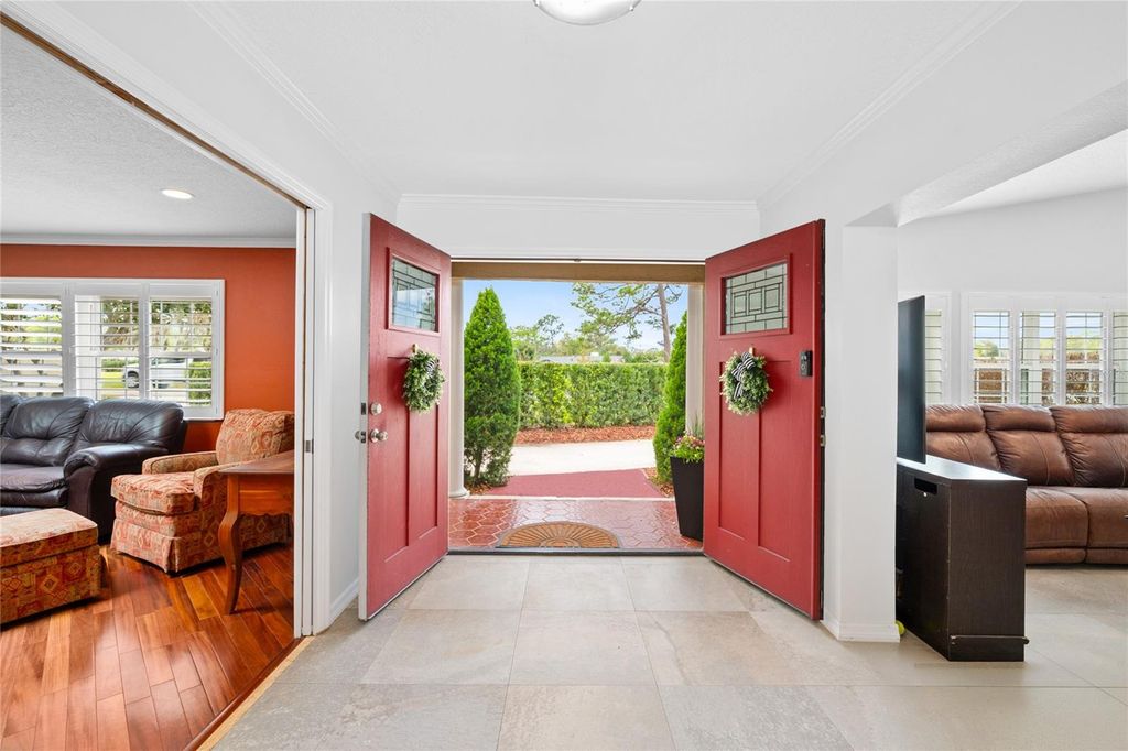 Photo of 305 Palm Springs Drive, Longwood, FL 32750 (MLS # O6392490)