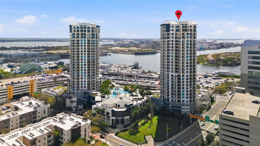 UTILITIES AND ALL FURNITURE INCLUDED EXCEPT GIRL'S BEDROOM FURNITURE. Experience elevated luxury living in the heart of Downtown Tampa at 449 S 12th St, Unit 604. This exceptional residence offers one of the most breathtaking views in the area, perfectly positioned to overlook the cruise port and the vibrant waterfront skyline. A huge round private balcony provides the perfect space to relax, entertain, and enjoy spectacular views of the city and arriving cruise ships. Located in the highly desirable Channel District, the condo places you steps from world-class entertainment at Benchmark International Arena, major museums, Straz Center for the Performing Arts, the scenic Tampa Riverwalk, and some of Tampa’s finest dining experiences. Residents enjoy resort-style amenities, including a beautiful swimming pool and two private dog parks. Enjoy unmatched convenience with Publix across the street, quick access to Tampa General Hospital, major interstates, and Tampa International Airport. Whether relaxing on your oversized balcony or experiencing the vibrant energy of Downtown Tampa just outside your door, this residence offers a rare opportunity to live in a premier home with one of the best views in the city.