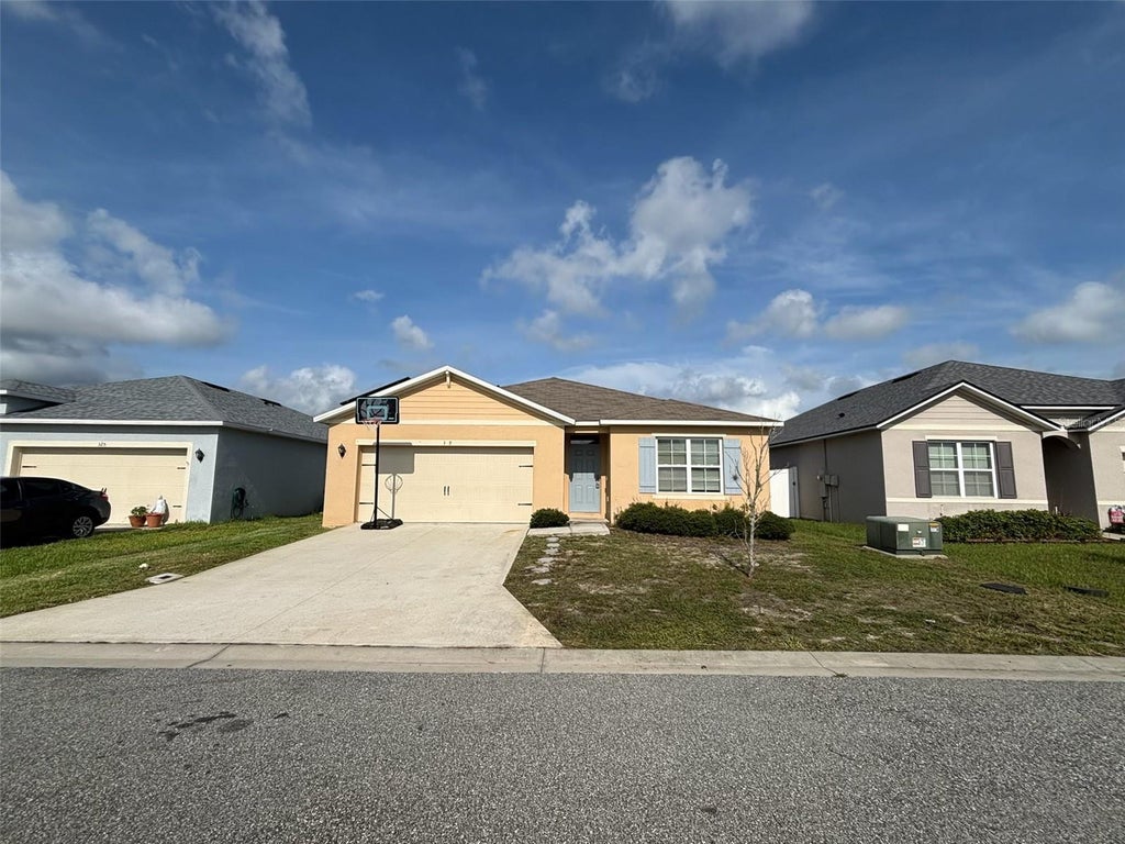 Photo of 329 Regency Ridge Drive, Davenport, FL 33837 (MLS # O6453300)