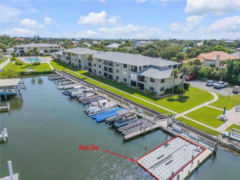 Photo of 2100 N Peninsula Avenue #305, New Smyrna Beach, FL 32169 (MLS # NS1088753)