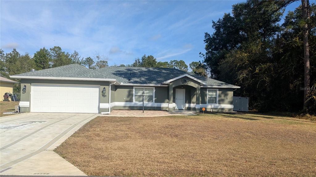 Photo of 4989 SW 128th Street, Ocala, FL 34473 (MLS # O6369196)