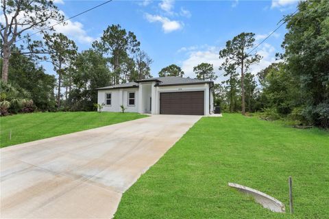 Photo of 858 Portland Street E, Lehigh Acres, FL 33974 (MLS # A4659179)