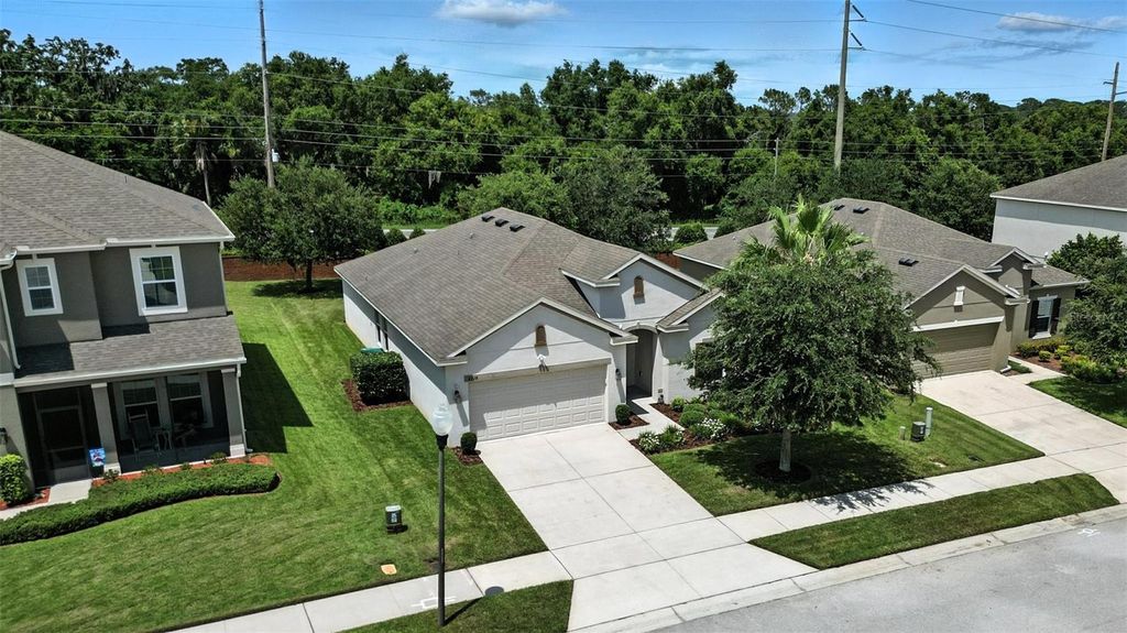 Photo of 2718 Limerick Circle, Grand Island, FL 32735 (MLS # O6322640)