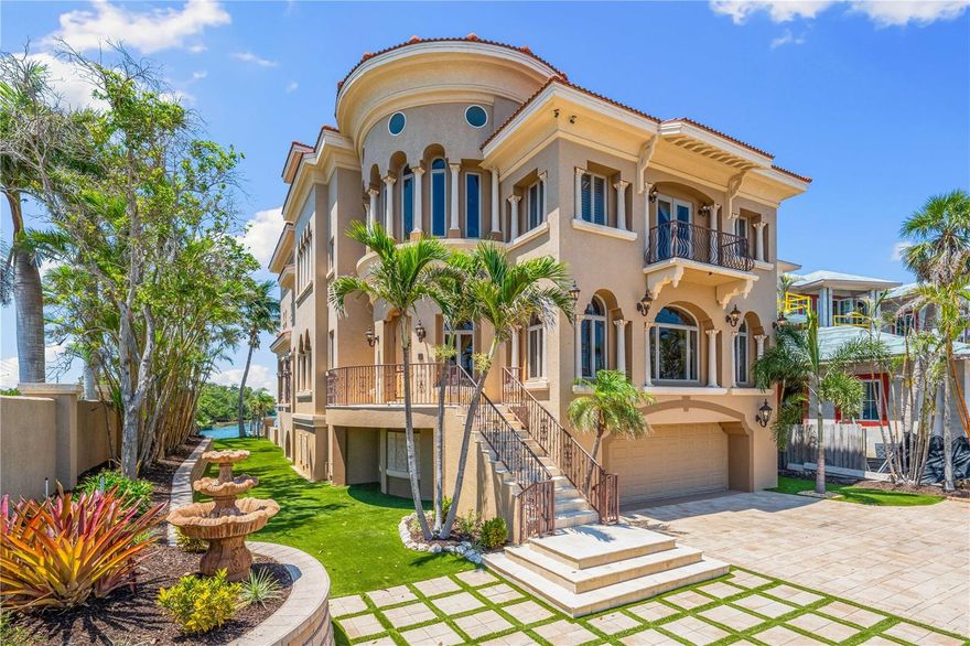 A boater's dream and RARE opportunity—One of just 39 homes on this EXCLUSIVE side of St. Armands Circle offering -DIRECT GULF ACCESS- NO FIXED BRIDGES - and NO OBSTACLES. True deep-water dockage that comfortably accommodates a vessel over 60 feet.
Enjoy full waterfront views of Sarasota Bay and the iconic downtown Sarasota skyline from every north-facing room in this home.
This stunning, gated waterfront estate showcases the timeless elegance of Mediterranean architecture, blending classical design with refined coastal living. Expertly engineered with solid poured concrete walls reinforced by structural steel beams, this residence offers unmatched strength, integrity, and long-term value—an ideal foundation for both luxury and peace of mind.
This Venetian-inspired estate is a rare architectural masterpiece, showcasing meticulously hand-applied Venetian plaster walls that exude artisan-crafted elegance—both refined and truly one-of-a-kind. The home features unmatched fit and finish throughout the entire residence.
The primary floor of this home is thoughtfully designed for seamless living and exceptional entertaining value.
Take in full waterfront views of Sarasota Bay and the downtown skyline while preparing a meal in the master-crafted kitchen or relaxing on the expansive waterfront veranda. 
The kitchen is an authentic showpiece and a true chef’s dream, featuring professional-grade appliances, a robust gas range with multiple burners, hand-carved cabinetry, and marble flooring throughout.
This four-story home is equipped with a whole-house elevator for effortless access to each level.
With an expansive extended garage, it’s ideal for car enthusiasts, offering multiple storage bays and additional space for organization.
Looking for ease of maintenance? Enjoy the recently installed, top-of-the-line polymer turf surrounding the home. The luxury pool and spa features all brand new equipment and water heater, a premium-grade saltwater chlorination system, complete with full automation and water features. Delivering crystal-clear water and low-maintenance convenience. 
St. Armands Circle is one of Sarasota’s most coveted and prestigious addresses. This home's premier location places you just steps from Lido Beach. Frequent festivals, classic car shows, and seasonal events make the area lively year-round. Choose from gourmet restaurants, boutique shops, and family-friendly activities as you stroll the Circle. Downtown Sarasota’s theaters, museums, and fine arts venues are just a short drive away.
For golf enthusiasts, this home is minutes from The Longboat Key Club—one of Sarasota’s most prestigious private clubs. The club features 45 holes of championship golf across two beautifully maintained courses and a full-service, resort-style experience including a world-class tennis center, private beach, deepwater marina slips, full-service spa, upscale dining, and an active calendar of social events.