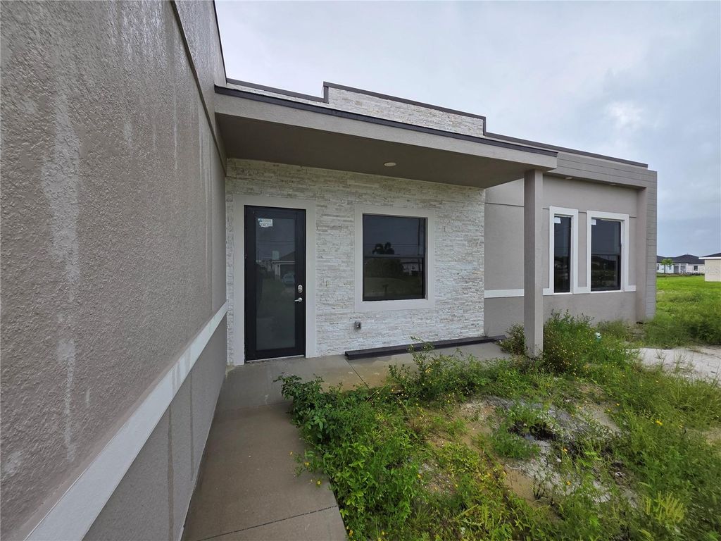 Photo of 1035 Kismet Parkway W, Cape Coral, FL 33993 (MLS # S5140242)