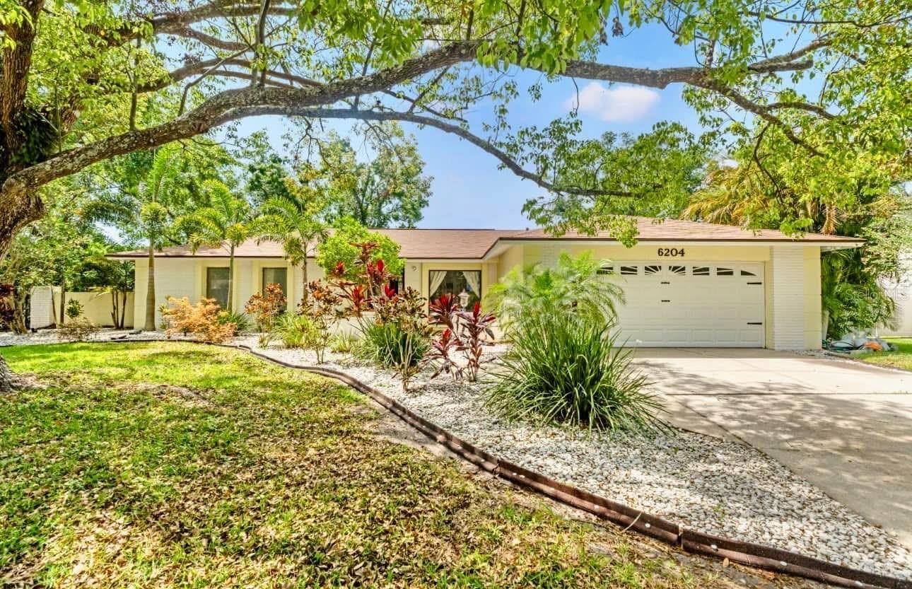 Exceptional opportunity in the heart of Temple Terrace.
Situated on a rare corner double lot, this 4-bedroom, 2.5-bathroom pool home offers a perfect blend of space, function, and refined upgrades. Inside, you'll find an open-concept layout with a split floorplan, ideal for both everyday living and entertaining. The interior features marble tile, waterproof laminate flooring, 5¼-inch baseboards, and a wood-burning fireplace that adds warmth and character.
The kitchen is well-appointed with granite countertops, stainless steel appliances, and generous cabinet space. The primary suite includes dual vanities and an oversized walk-in shower, providing a private, comfortable retreat.
Natural light pours in through three sets of sliding glass doors, opening to a spacious patio and solar-heated pool. A dedicated pool bathroom adds convenience, and there’s also secure space behind the fence for boat or commercial vehicle parking.
Located in a quiet, established neighborhood with quick access to USF, Moffitt, Shriners, VA and Advent Hospitals, I-75, and I-275—this home checks all the boxes for comfort, functionality, and location.
Don’t miss your chance to view this exceptional property—schedule a private showing today.