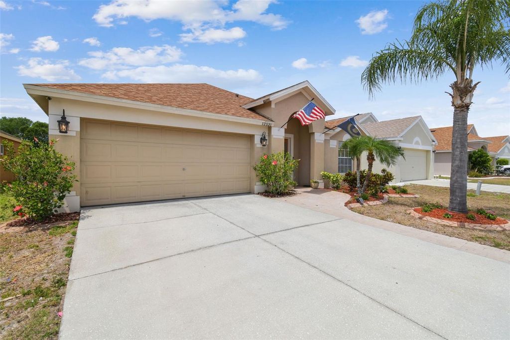 Photo of 12531 Midpointe Drive, Riverview, FL 33578 (MLS # TB8378345)